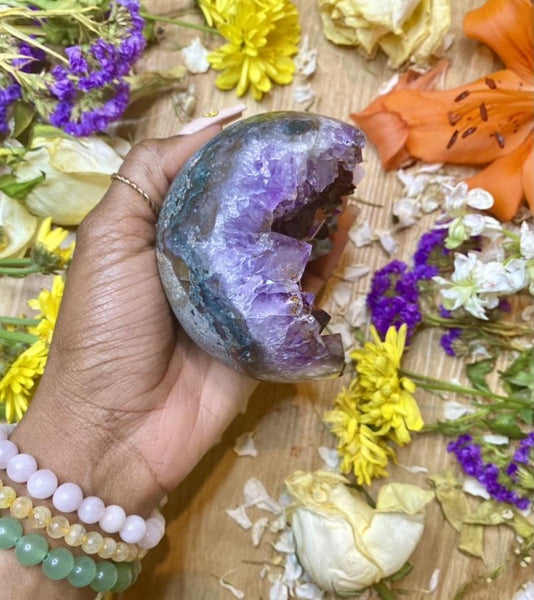 Amethyst works to relieve our minds of worry, stress, or tension. Amethyst helps to remove any mental distractions or clutter. It also strengthens our intuitions and deepens our connection with our higher selves. Amethyst Half-Sphere Geode pictured.
