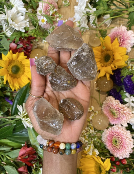 Smoky Quartz is a grounding stone. It helps to harmonize our bodies and souls so that we may focus on the present moment. It also helps in maintaining stability in emotions and feelings. Shop raw Smoky Quartz.