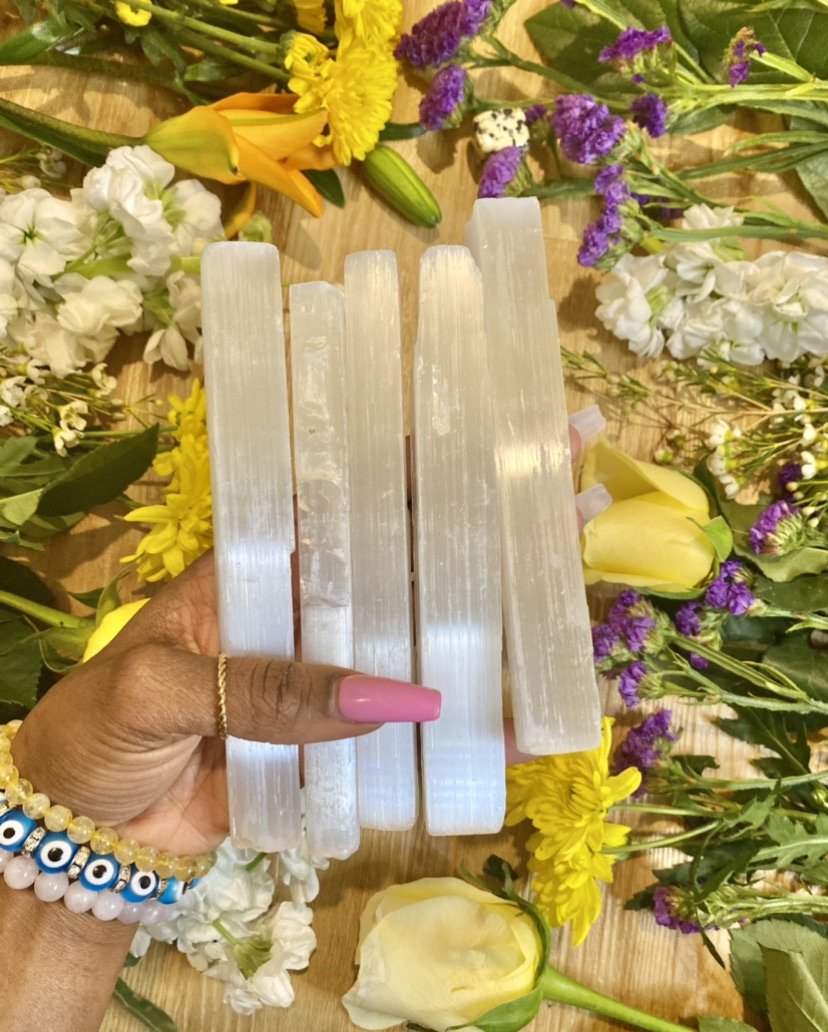 Selenite is a powerful cleansing and protective stone. Selenite cleanses other crystals, our auras, and our environments. Selenite (Satin Spar) wand pictured.