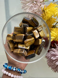 Tigers Eye balances the Root Chakra and helps us to hop into our personal power to increase self-worth. This stone helps us work through issues of self, such as self-esteem and self-confidence. It welcomes courage, motivation, and faith as we tackle what life throws our way. Shop tumbled Tigers Eye. 