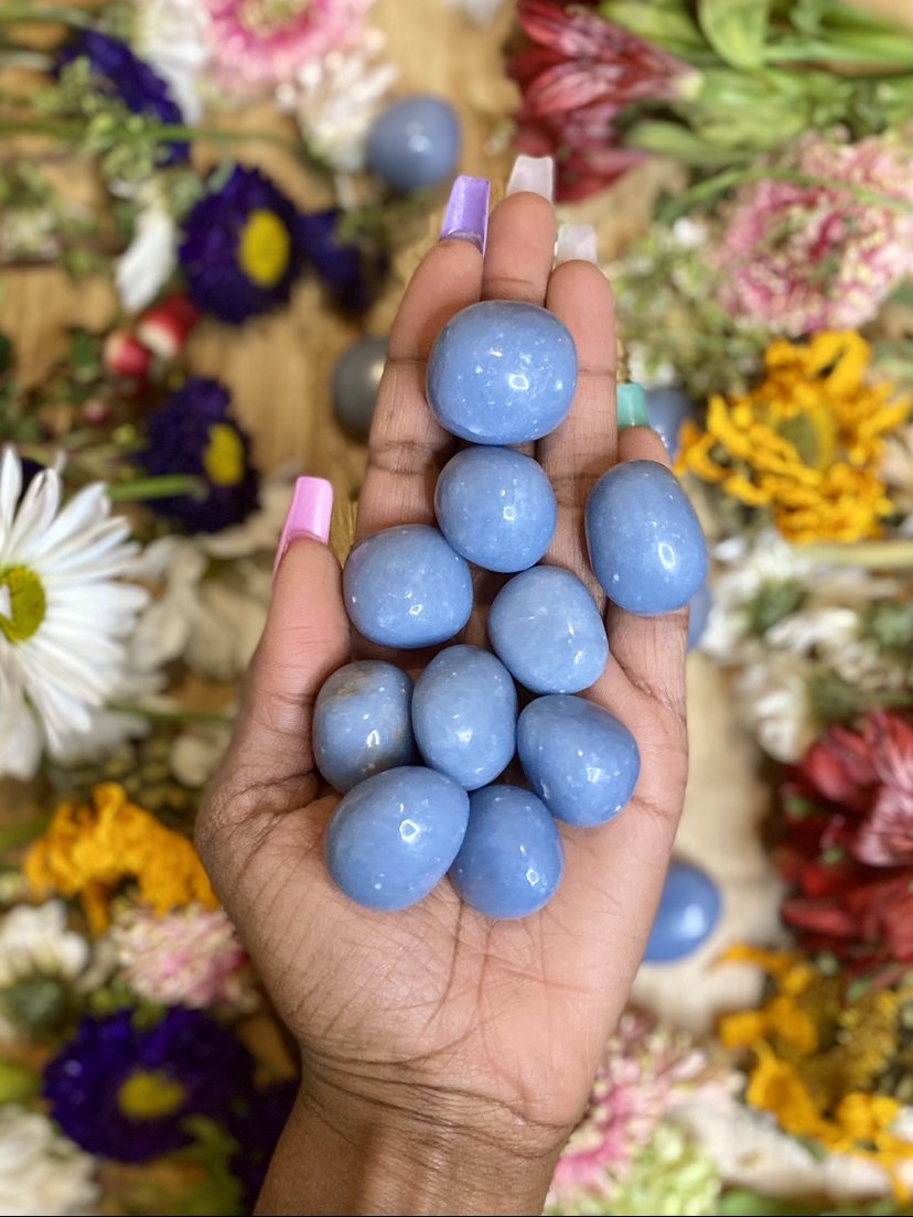 Angelite helps us to speak our truths in a healthy manner. It heals the Throat Chakra, promoting adequate communication and self-expression. Tumbled blue Angelite pictured.