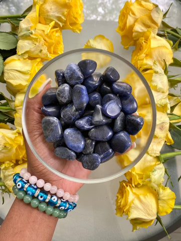 Sodalite aids in tranquility and peace. When we're experiencing trouble detaching from the past or a bad experience, sodalite helps us find peace. Shop tumbled Sodalite.